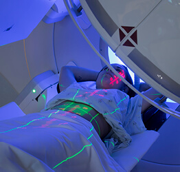 Image of patient receiving radiation treatment.