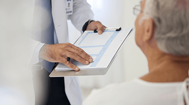 doctor showing results on tablet