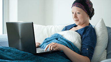 cancer patient on computer