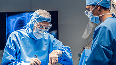 surgeons performing operation