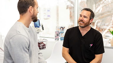 Image of doctor talking to patient.