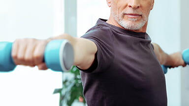 Image of man lifting weights