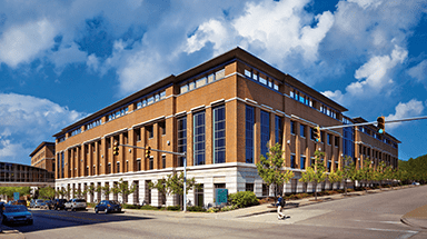 Outdoor photo of Hillman Cancer Center on a sunny day