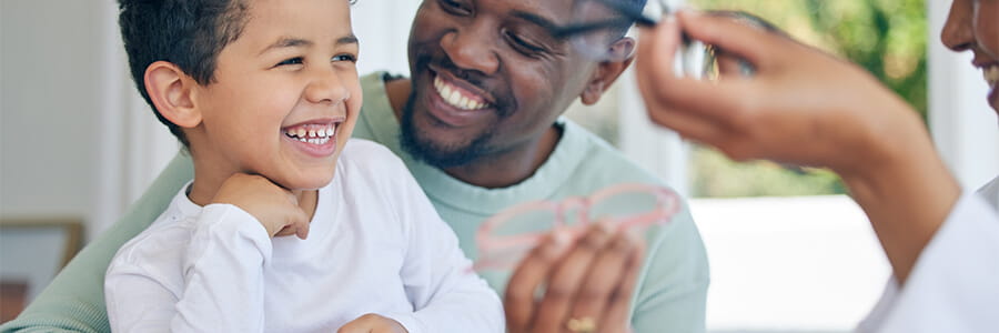 Woman doctor looking into girl's mouth