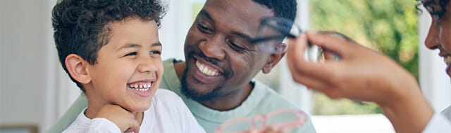 Woman doctor looking into girl's mouth