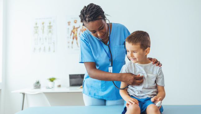 Provider listening to a child's heart with a stethoscope