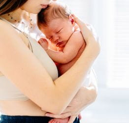 Mom holding an infant