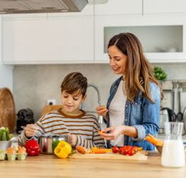 Mom and child cooking together
