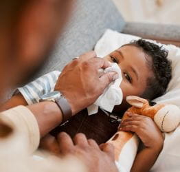 Girl having her height measured