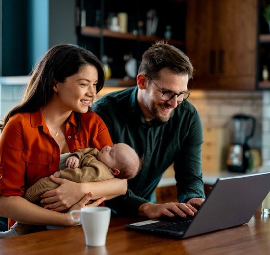 Family looking at computer