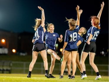 Team of girls celebrating