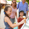 A girl holding an ice cream cone