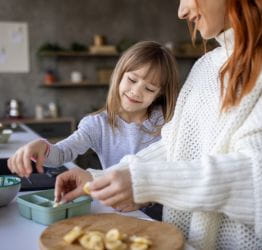 Mom and child making lunch
