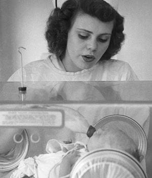 1951 Esther Bubley feeding isolette