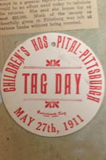 One of the tags from the first “Tag Day” in 1911, pasted in the same scrapbook.