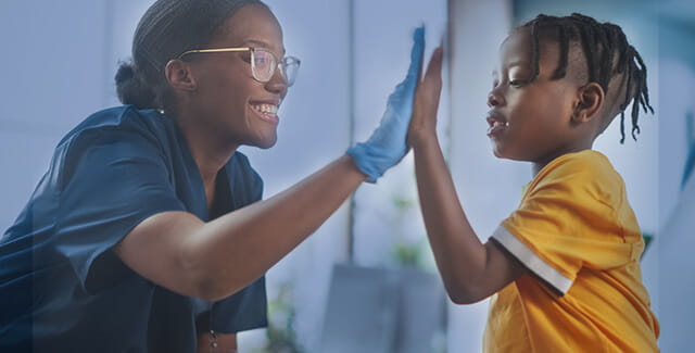 Doctor and patient high fiving