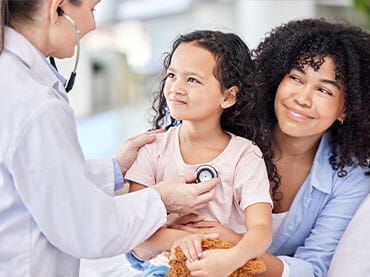 Parent/child/doctor in office setting