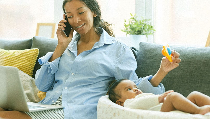 Mother talking on phone with pediatrician