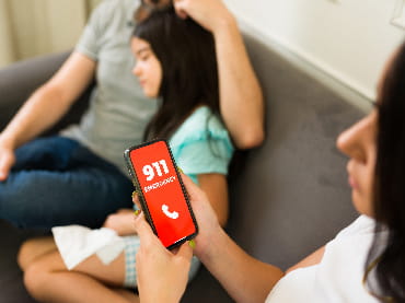 Cell phone showing 911 on screen