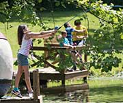 Girl fishing off the dock