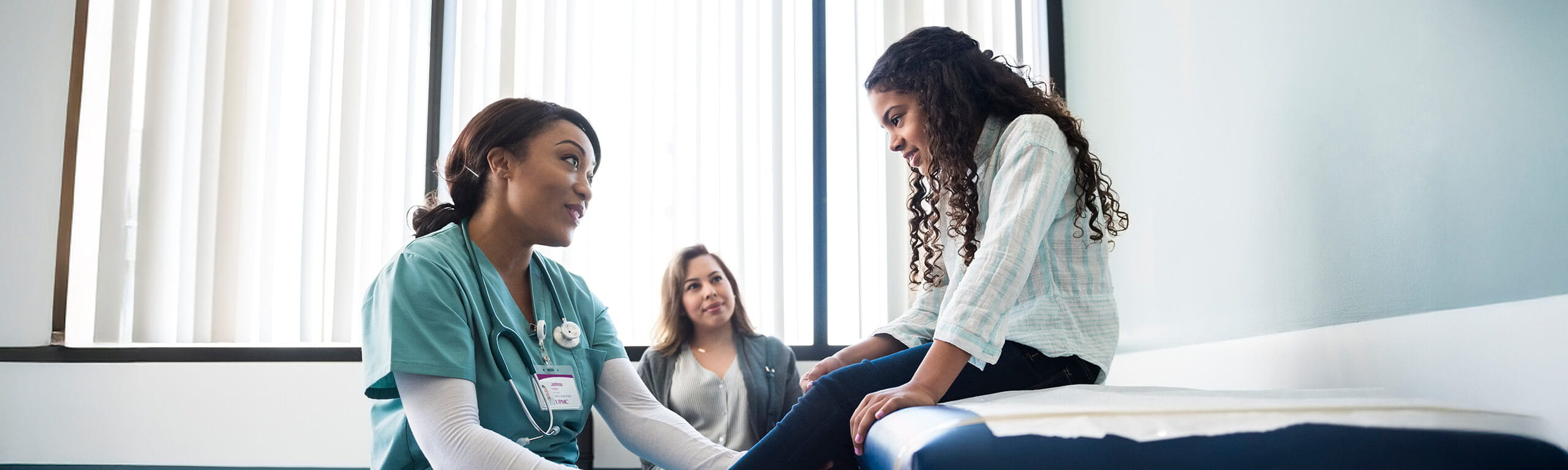 Doctor talking to her patient