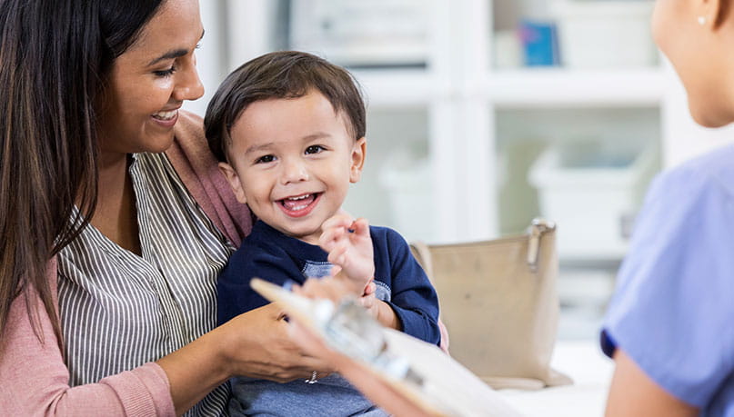 Young child laughing.