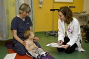 Doctors treat a child with brachial plexus injuries.