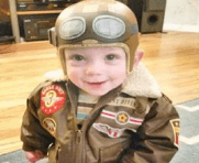 Baby in an aviator outift