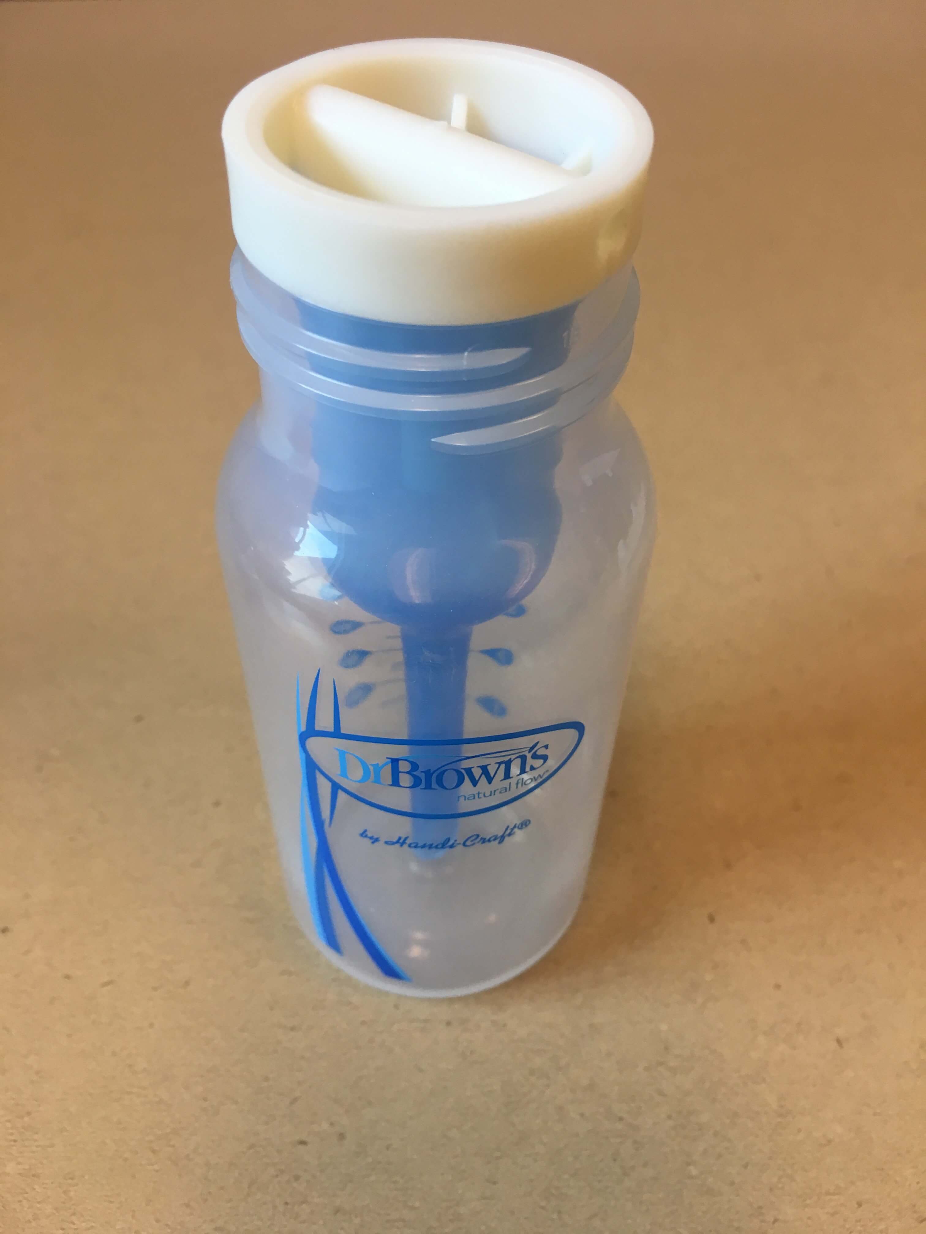 Blue vent insert in bottle