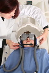 MRI uses a high-tech goggle system enabling a child to watch a movie with headphones during his or her scan as a type of distraction technique.