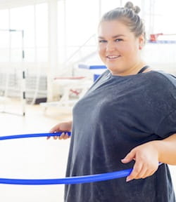 Girl holding a hula hoop