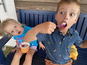 Teddy Boden and sister eating ice cream