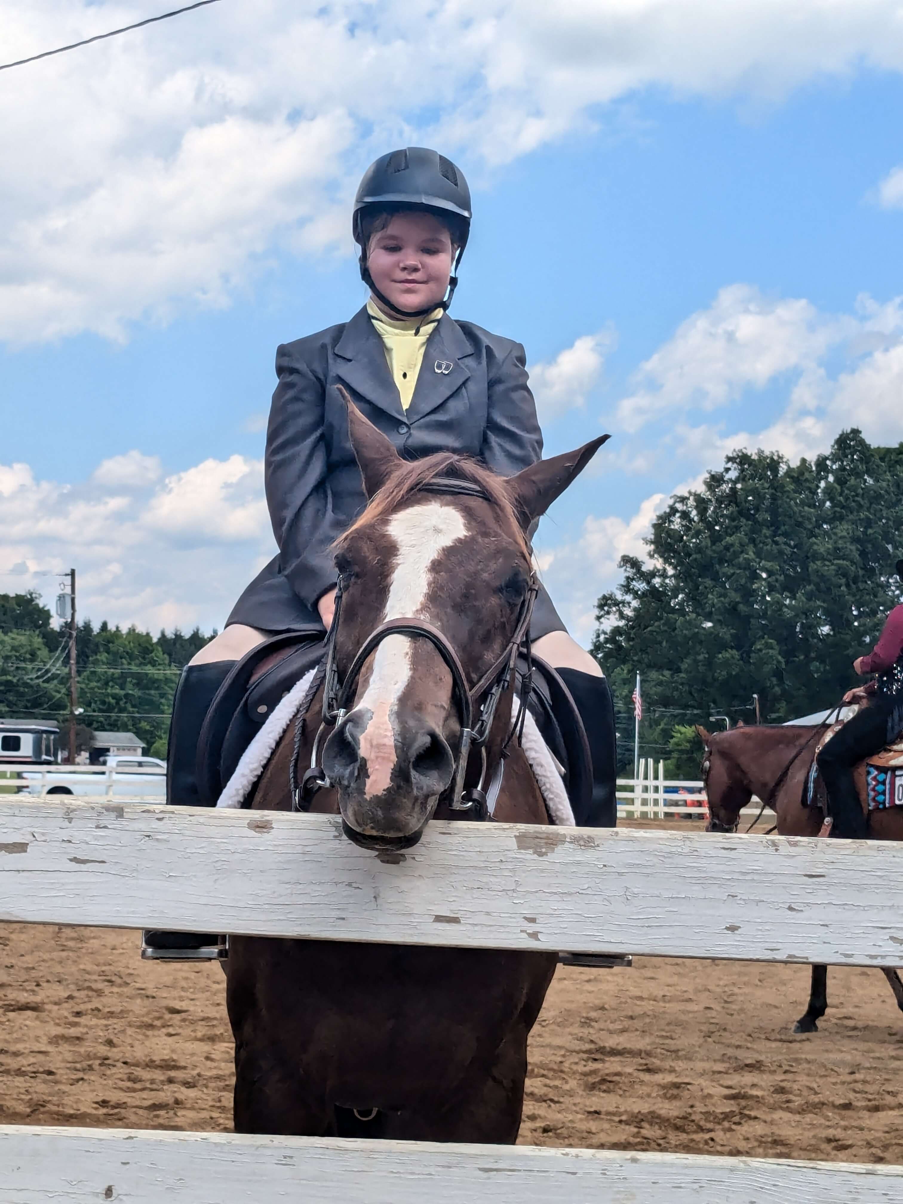 Brooklyn sitting on a horse