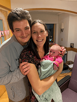 Felicity, a baby, with her mom and dad