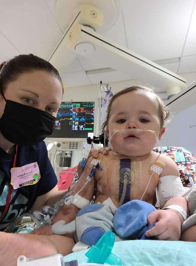 Baby Matthias in the hospital with a nurse.