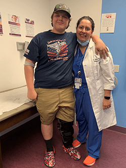 Image of Corey with Nurse.