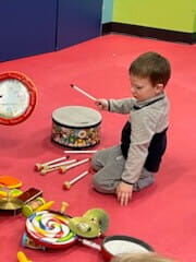 Hayden playing toy drums