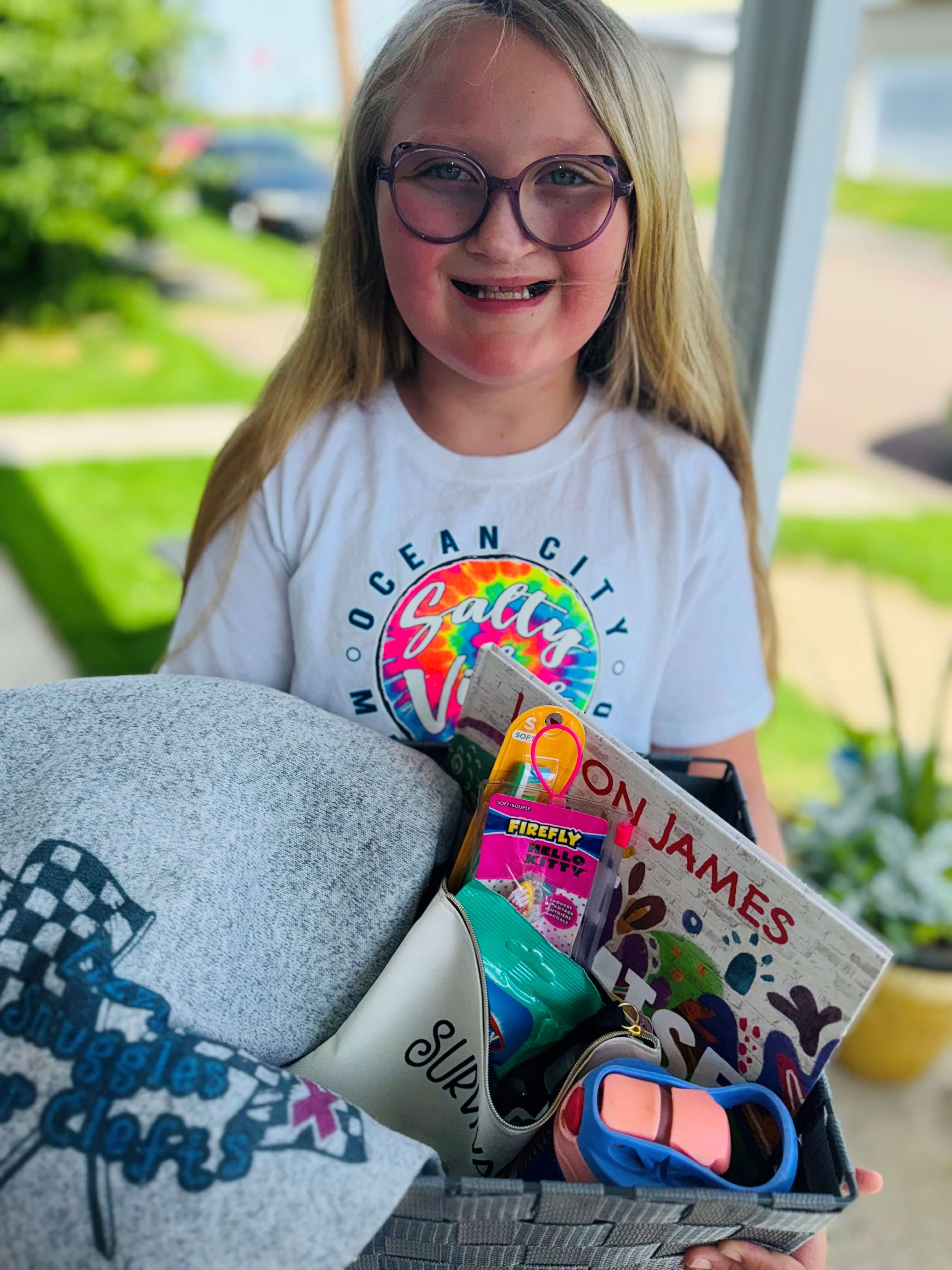 Lizzy Vogel holding a basket and smiling