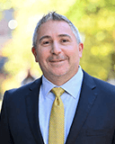 Image of Evan Facher, PhD, MBA.