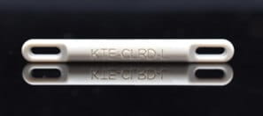 A cylindrical ligament retention device (CLRD) is employed to affix two ligament grafts. It can pass through a hole drilled within the distal humerus and the CLRD maintains equal tension of each graft limb.