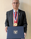 Image of Dr. Huq with his award.