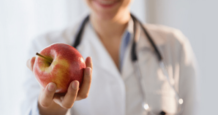 doctor with apple