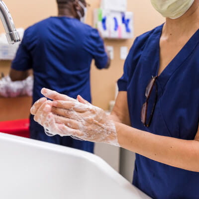 Image of nurse washing hands.