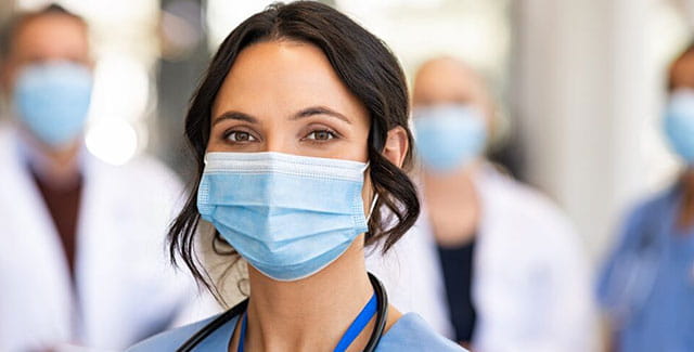 Doctor with a mask on.