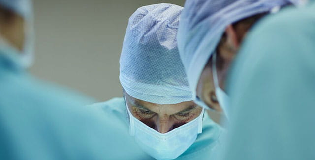 Doctor performing a surgery.