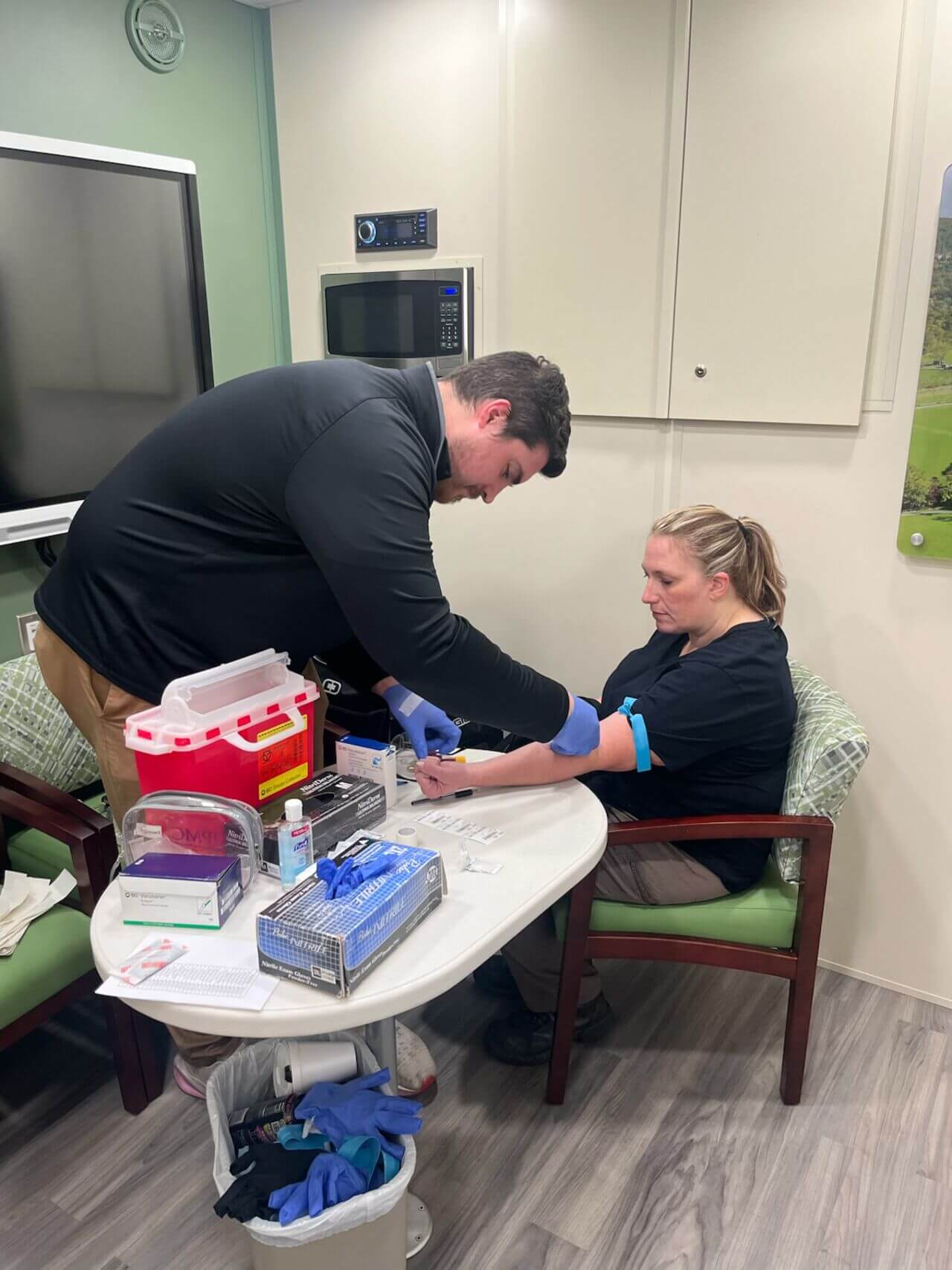 Someone getting their blood drawn