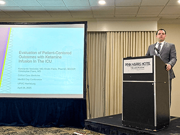 Image of fellow presenting.