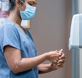 Report a concern callout image of medical professional typing.