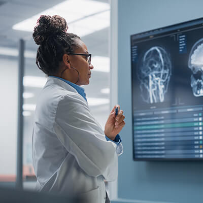 Image of provider looking at x-rays.