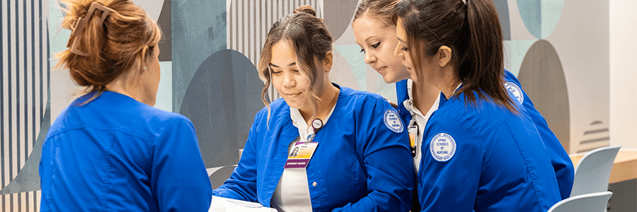 Image of students talking.